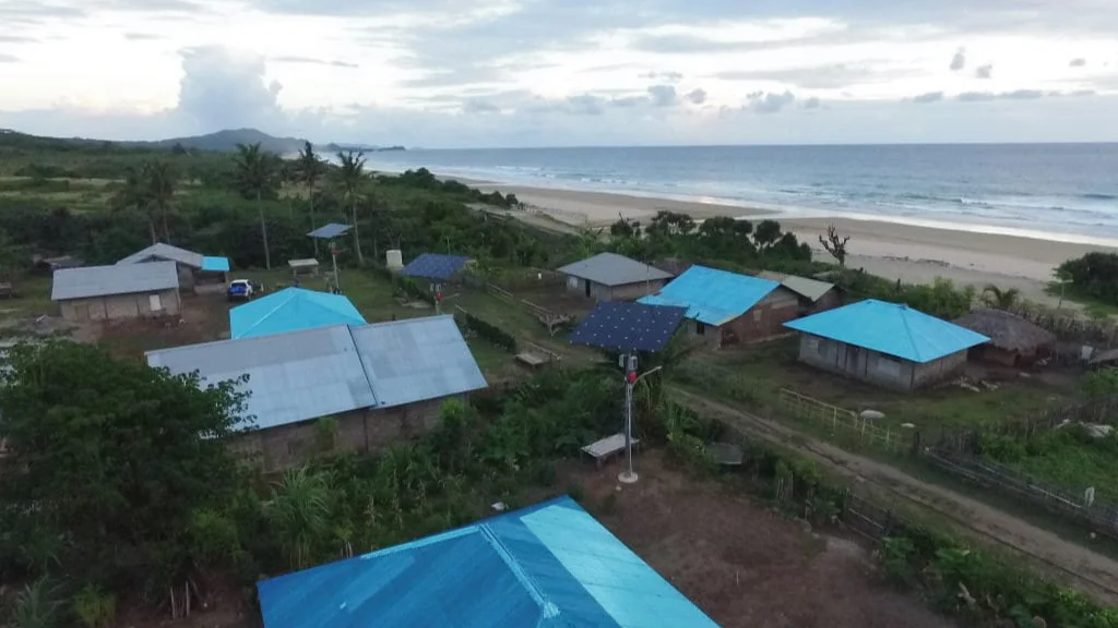Houses by the ocean and PROINSO's mini-grid solar projects in Indonesia